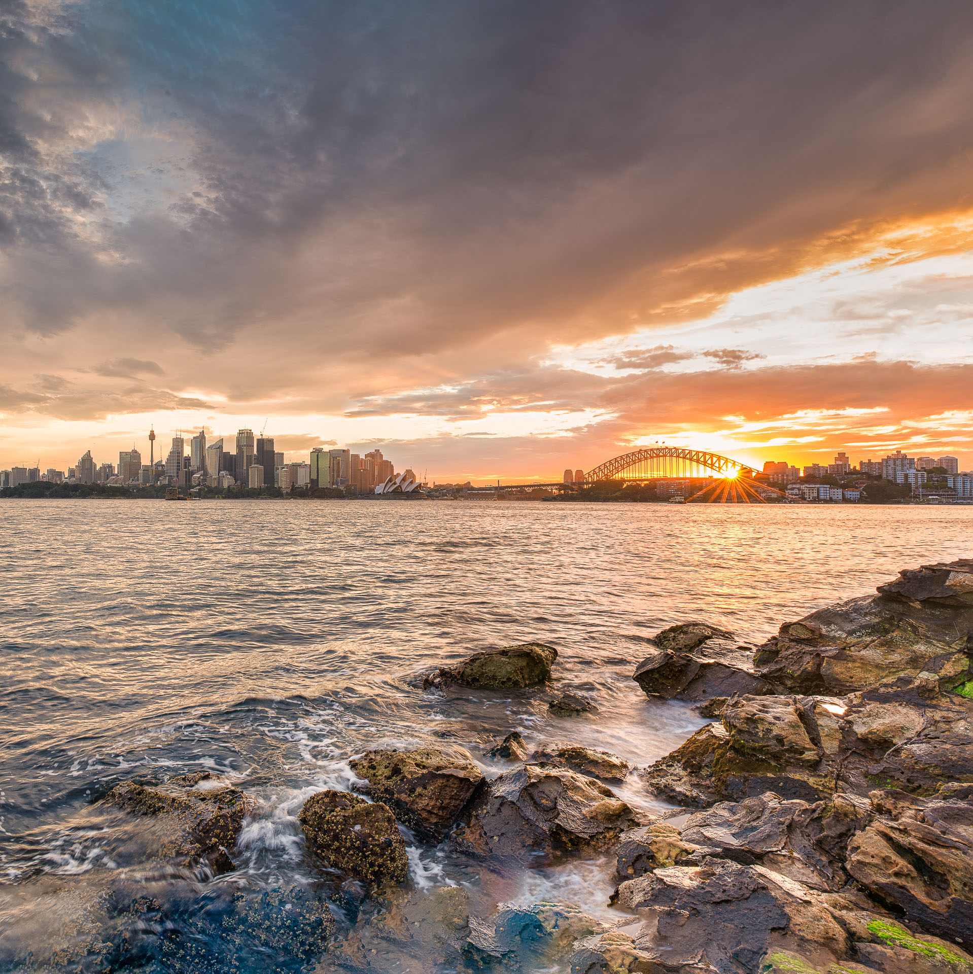 sydney skyline at sunset, sky on fire