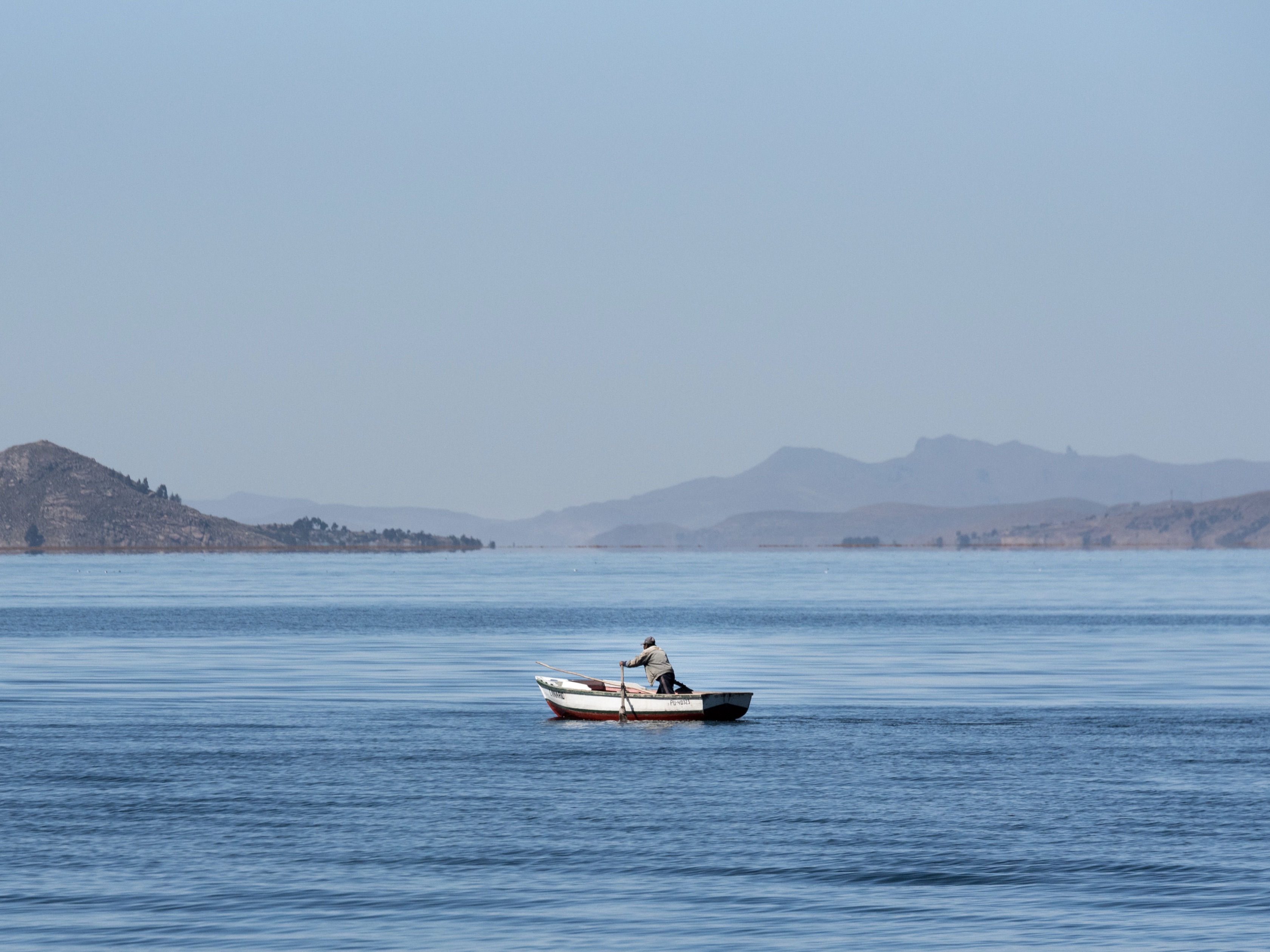 paddling boat in titicaca lake